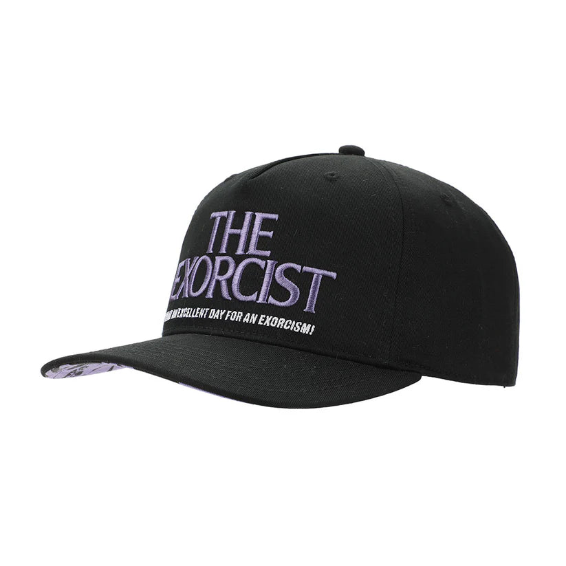 Black cap with 'The Exorcist' text on a white background
