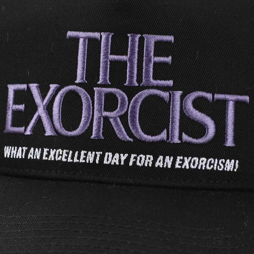 Black cap with 'The Exorcist' text and slogan on a black background