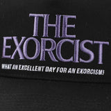 Black cap with 'The Exorcist' text and slogan on a black background