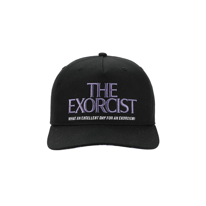 Black cap with 'The Exorcist' text on a white background