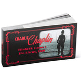Flipbook Volume 3 by Charlie Chaplin with a silhouette of a person on a white background. Flipbooks at the Academy Museum Store in Los Angeles