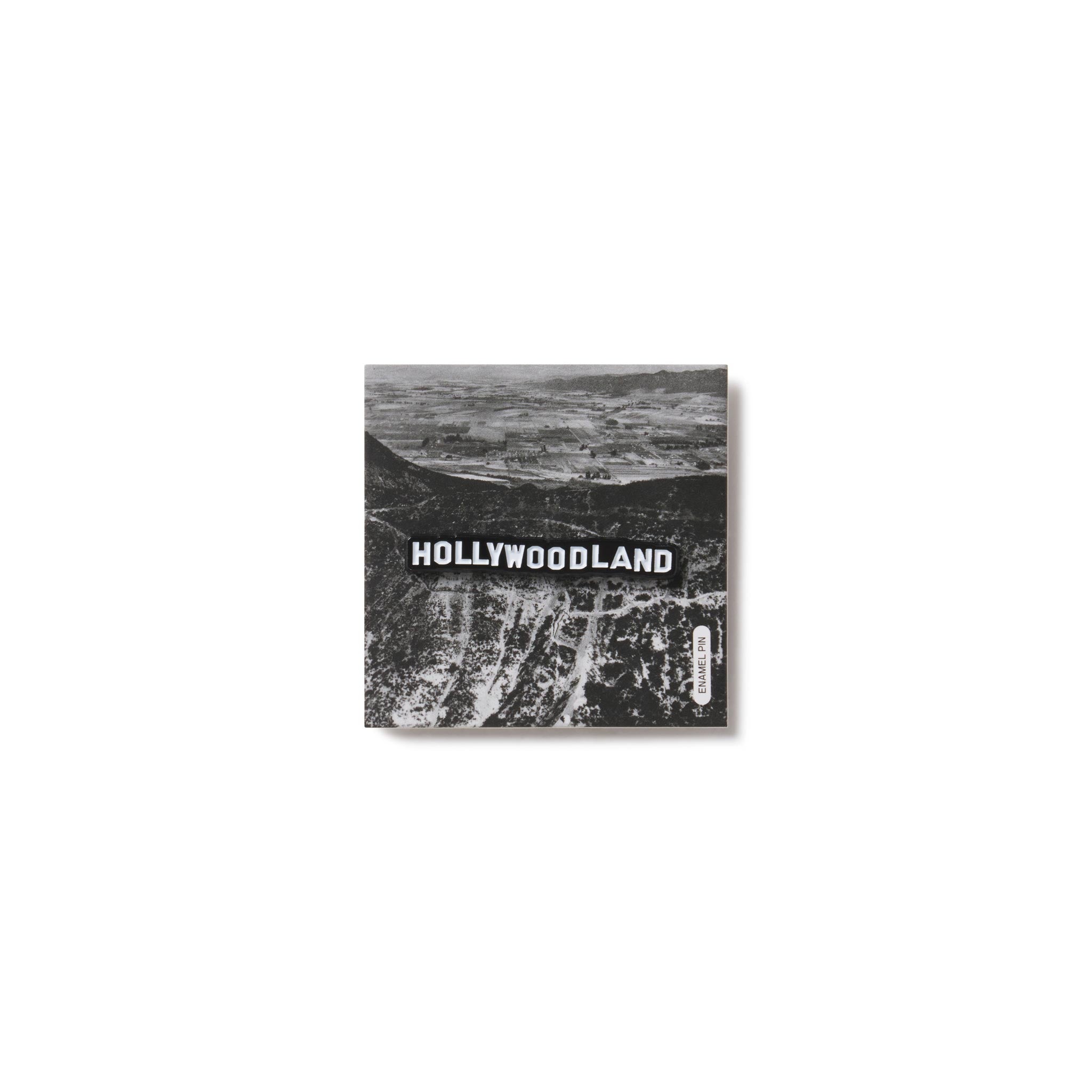 Hollywoodland sign in black and white on a white background