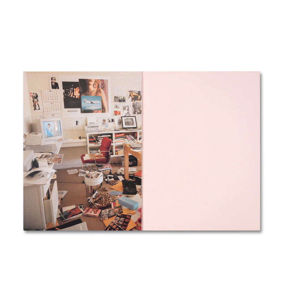 Two-page spread from a book or magazine showing a home office with a desk, computer, and various items.