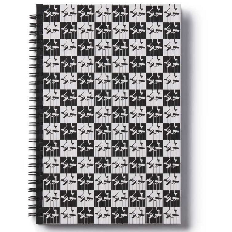 Notebook with black and white geometric pattern of The Godfather movie logo on a white background
