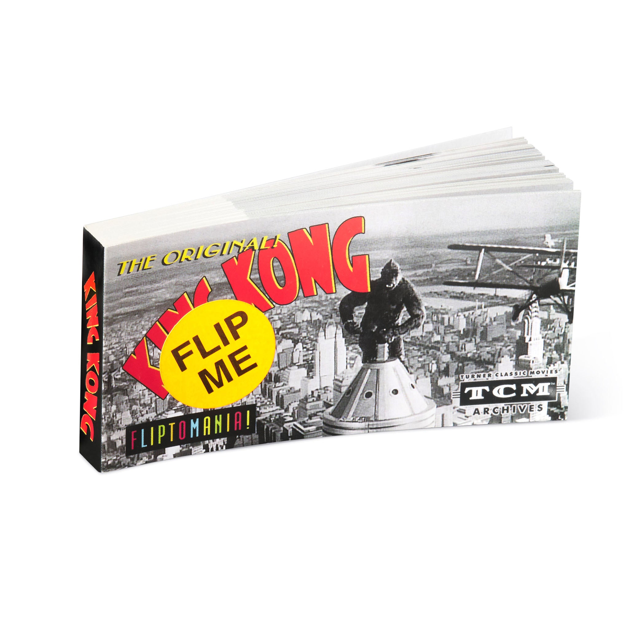 Kong Flip Me Fliptomania box with black and white image of Kong and yellow text on a white background. Flip books the path to cinema at the academy museum store in los angeles from the TCM Archives.