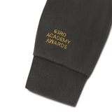 Black sweatshirt sleeve with '63rd Academy Awards' text in gold on a white background