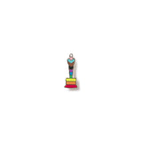 Colorful figure standing on a stack of books with a white background PRIDE FLAG OSCAR STATUE ACADEMY AWARDS PIN