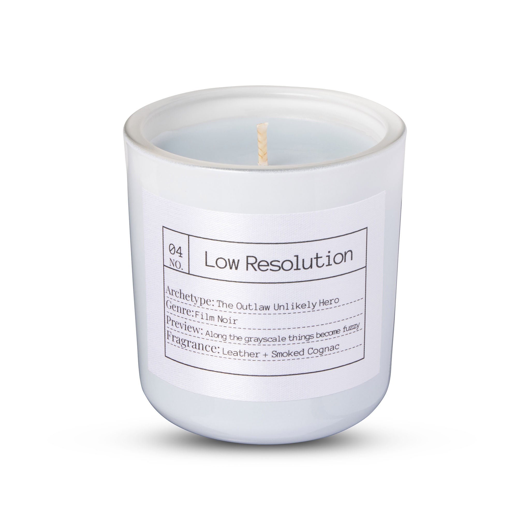 Movie Genre Theme Candle Film Noir in a white container with a label on a white background Indulge in the LOW RESOLUTION CANDLE, an 8oz soy candle featuring leather and smoked cognac scents. 40 hours of eco-friendly luxury in a recycled glass vessel.