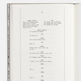 Open book with text on a white background