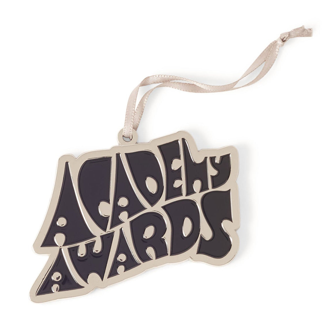 An enamel holiday ornament featuring the text 'Academy Awards' in a stylized font, with a ribbon attachment for hanging.