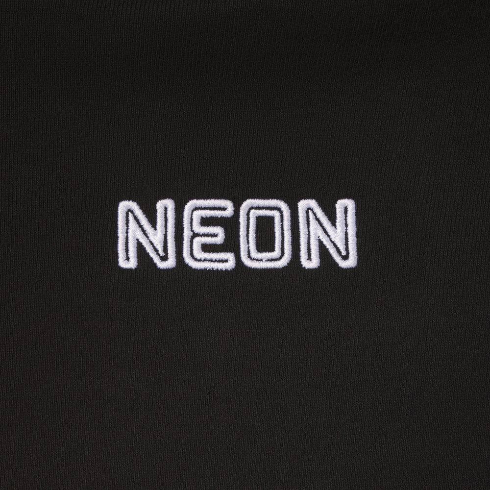 Black sweatshirt with 'NEON' embroidered in white on a black . movie logo of the oscar winning film Parasite by director Bong Joon Ho.background