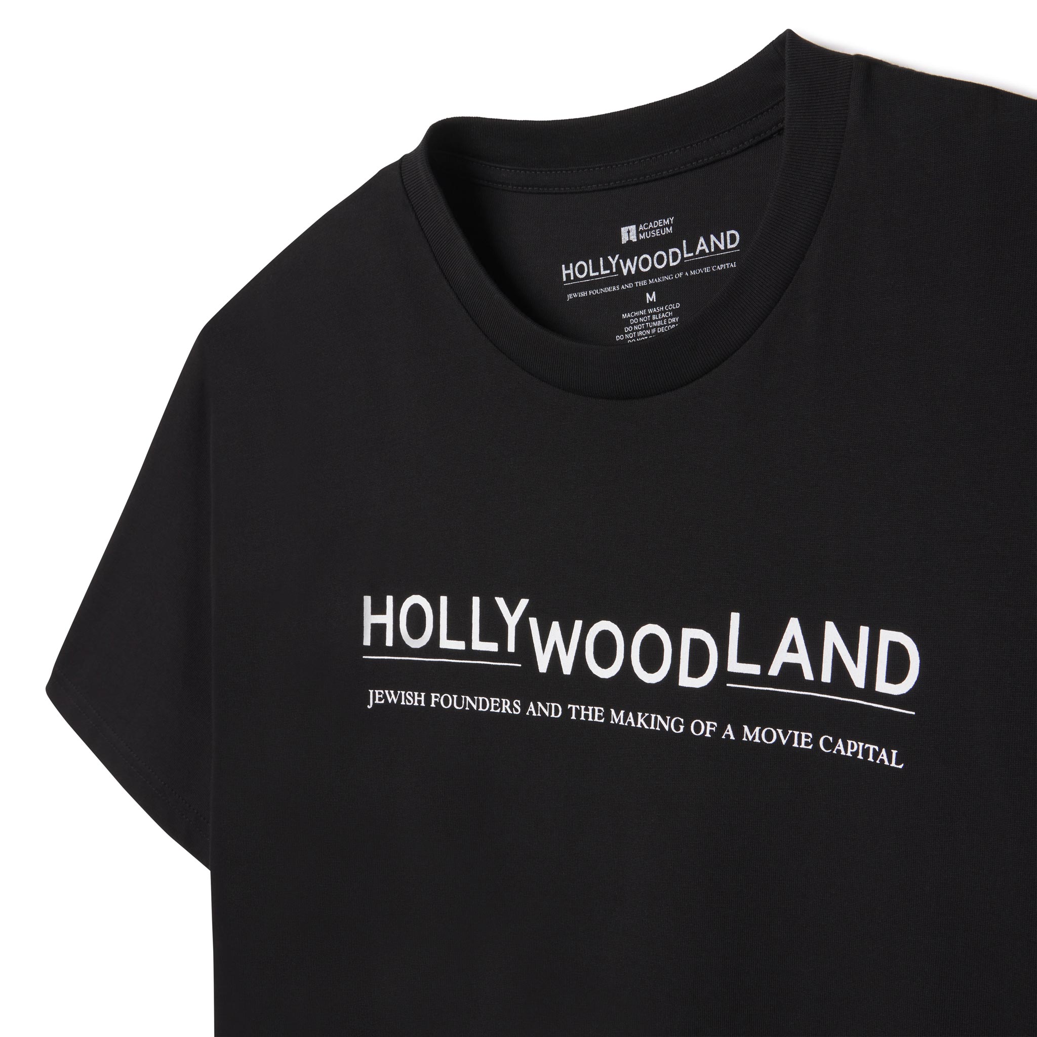 Black t-shirt with 'HOLLYWOODLAND' text on a white background