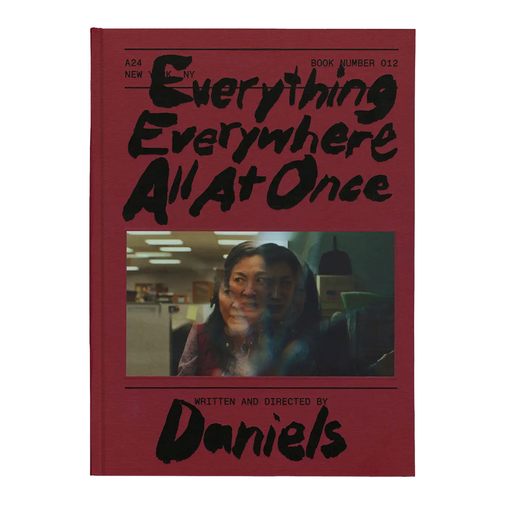 Screenplay Book cover of 'Everything Everywhere All At Once' with a person in an office setting