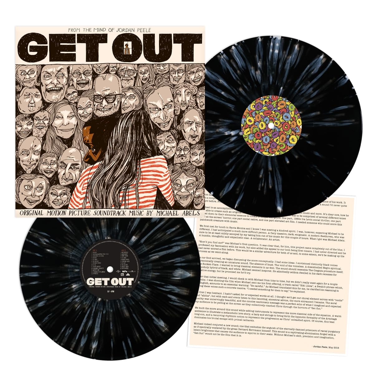 Vinyl record set with 'Get Out' movie cover and black splatter design