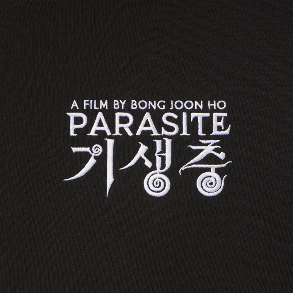 Title of the film 'Parasite' by Bong Joon Ho on a black background. movie logo of the oscar winning film Parasite by director Bong Joon Ho.
