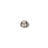 Small round metal lapel pin of Okja from the Bong Joon Ho movie Okja on a white background