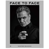 Book cover of 'Face to Face' by Manfred Baumann with a black and white portrait of a man.
