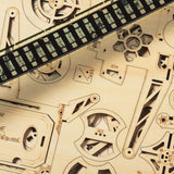 Close-up of a mechanical wooden puzzle with gears and components.