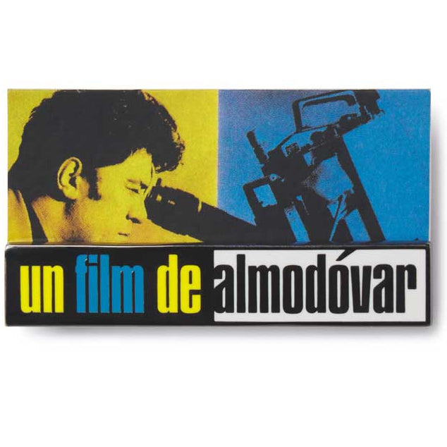 Logo with a silhouette of a person and a camera, featuring the text 'un film de almodóvar' on a white background. Pedro Almodovar exclusive lapel pin