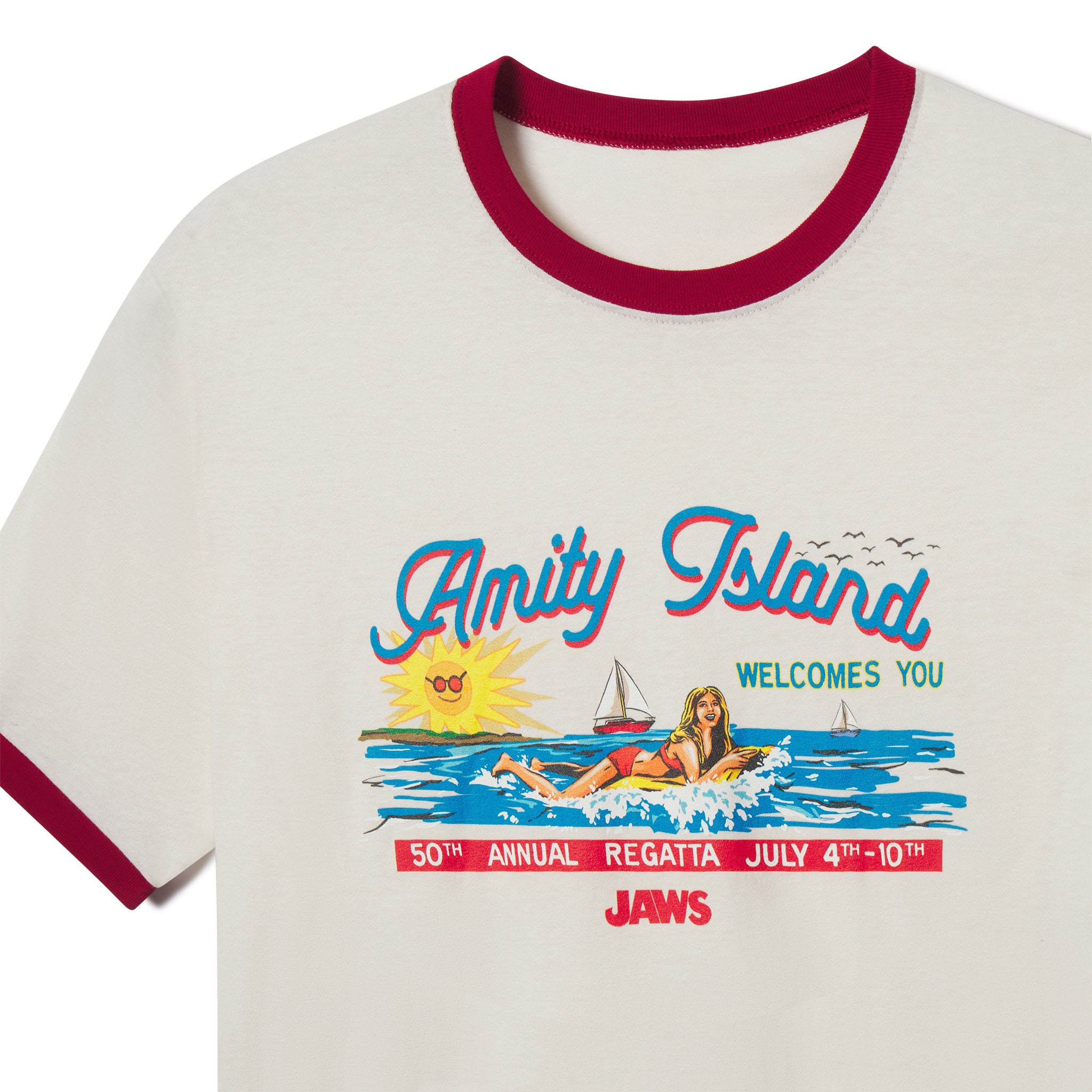 T-shirt with 'Amity Island Welcomes You' graphic and 'Jaws' branding on a white background