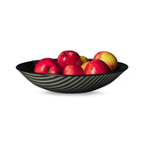 Explore Kiku Handmade's stunning black glass bowl, adorned with a film graphic. Each piece is meticulously crafted by Laurie Freivogel in Chicago, merging art and design.