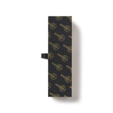 Black and gold gift box featuring the Oscar Statuette design repeated all over the box. Oscar Statue the Academy Awards Show official Oscars Logo Merchandise Collectible Pen in Gift Box