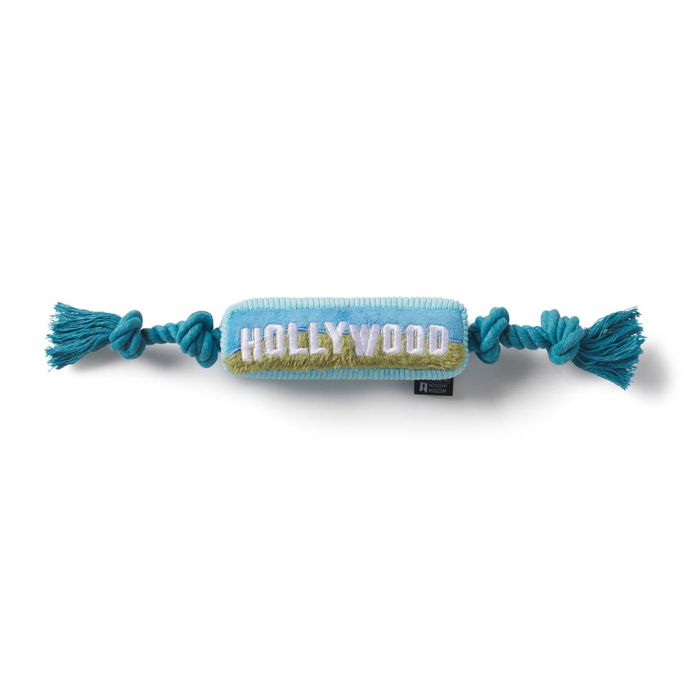 Treat your dog to the Hollywood 100 Exclusive Toy! Designed for durability and fun, this plush tribute to the iconic sign is a must-have for pet lovers.