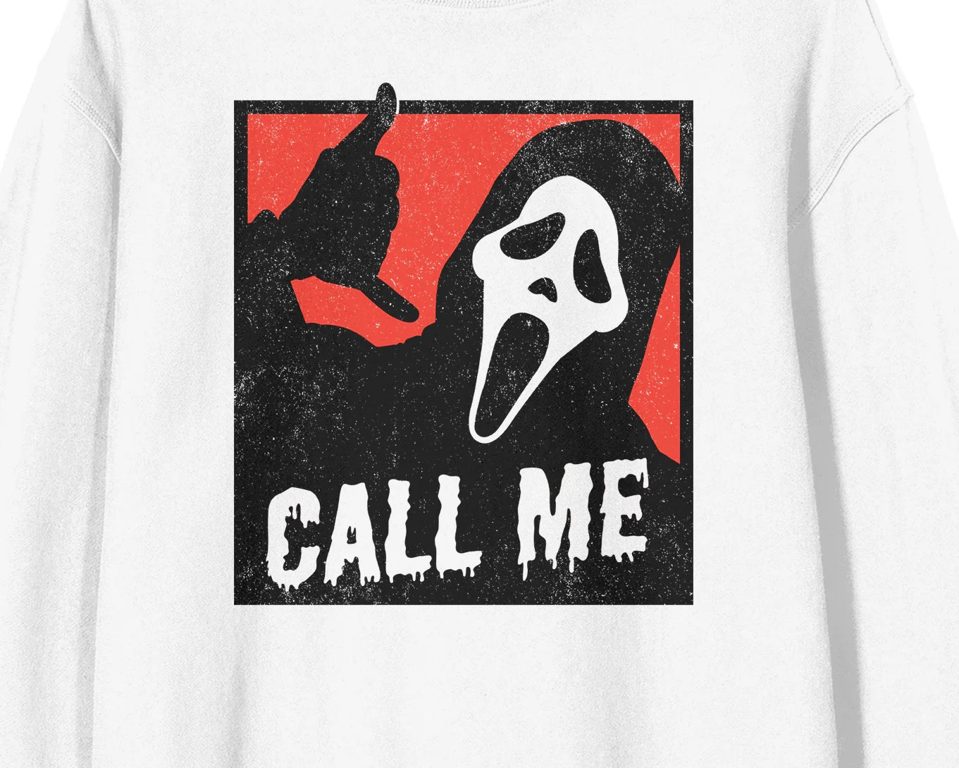 White sweatshirt with a graphic design featuring a ghost face and text on a red background. Stay warm and stylish with our Ghostface "Call Me" sweatshirt! Made from high-quality materials, it's the perfect gift for horror movie lovers.