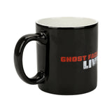 Black mug with 'Ghost Face Live' text on a white background. Sip your favorite drink in style with our Ghost Face Lives 16 Oz. Ceramic Mug! Perfect for Scream fans, it's microwave and dishwasher safe for easy care.