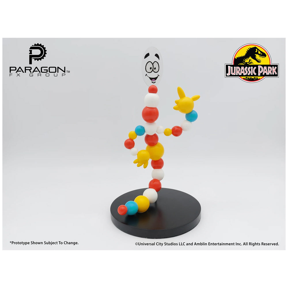 Colorful character figure on a stand with Paragon FX Group and Jurassic Park logos. Jurassic Park Mr. DNA Authentic Movie Prop Replica at The Academy Museum Store Los Angeles