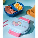 View of bento lunch box interior with food