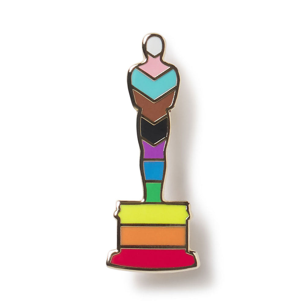 Colorful statue-shaped pin on a white background Oscar Statuette pin in LGBTQ+ Pride Flag Colors