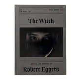 The cover of 'The Witch Screenplay Book' featuring a dark, moody image of a person's face partially illuminated, with the title and author's name, Robert Eggers, displayed.