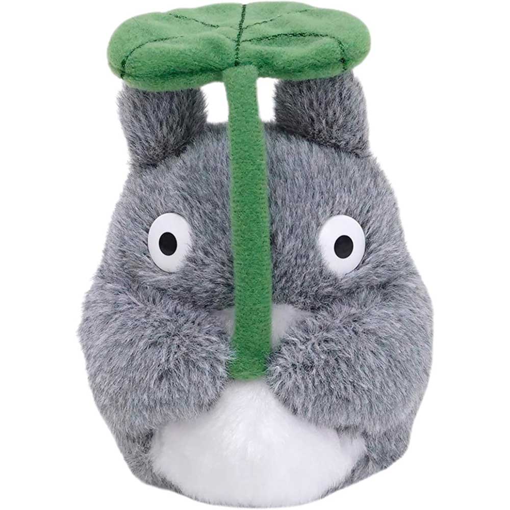 Plush toy of a character with a green leaf on a white background. Embrace the cuteness of Totoro with this 4-inch bean bag plush! Perfectly soft and officially licensed, it's an ideal collectible for Studio Ghibli enthusiasts.
