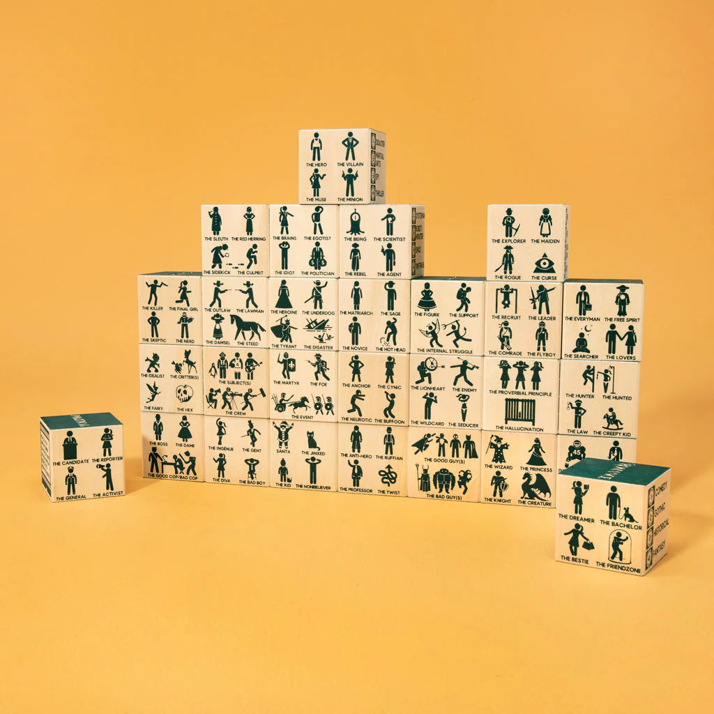 Stack of wooden blocks with illustrated figures on a yellow background Uncle Goose makes wooden toys and decor handcrafter in Grand Rapids, Michigan, using choice materials from around the Great Lakes.  Uncle Goose toys are the building blocks of creativity. In a child's hands, Uncle Goose blocks can become anything. Use them to inspire your imagination. 100% Made in the USA.