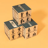 Stack of three cardboard cubes with character illustrations and text on a yellow background. Uncle Goose makes wooden toys and decor handcrafter in Grand Rapids, Michigan, using choice materials from around the Great Lakes.  Uncle Goose toys are the building blocks of creativity. In a child's hands, Uncle Goose blocks can become anything. Use them to inspire your imagination. 100% Made in the USA.