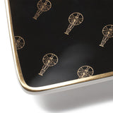 closeup view of the corner showing the vintage Academy Awards logo and the gold edge.