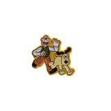 A pin badge featuring cartoon characters Wallace and Gromit from Aardman Animations. The pin is gold-colored with the characters in a colorful outfit and a dog.