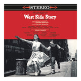 Cover of the West Side Story vinyl record featuring a black and white photograph of a woman jumping in the air with a man running alongside her, set against a red background with the title text.