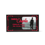Flipbook cover featuring Charlie Chaplin with a silhouette and text on a black border. Flipbooks at the Academy Museum Store in Los Angeles