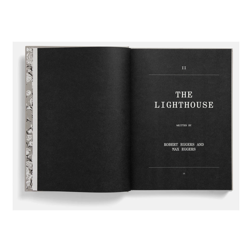 Open book showing a chapter titled 'The Lighthouse' by Robert Eggers and Max Eggers on a white background.