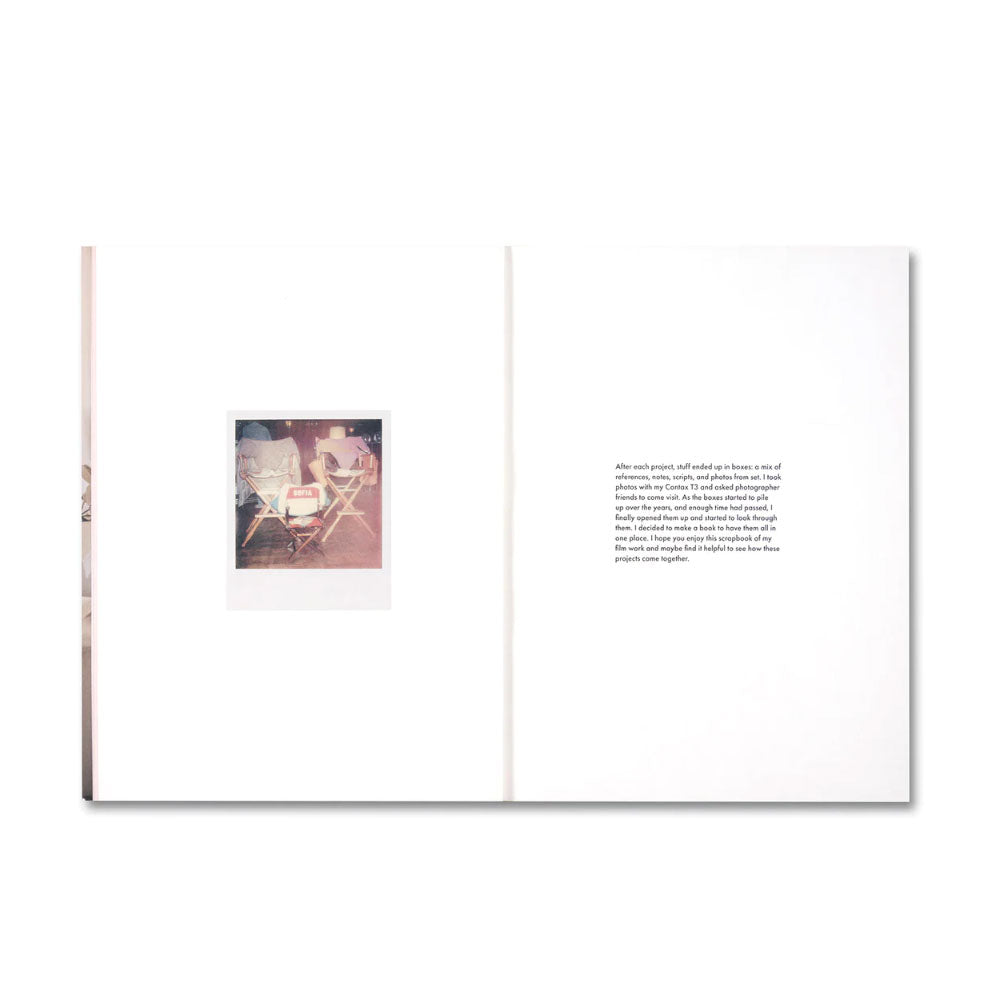 Open book with a photograph and text on a white background