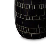 Black cylindrical vase with white line pattern on a white background Black mosaic vase on a white background by ceramicist Wayne Perry in Los Angeles