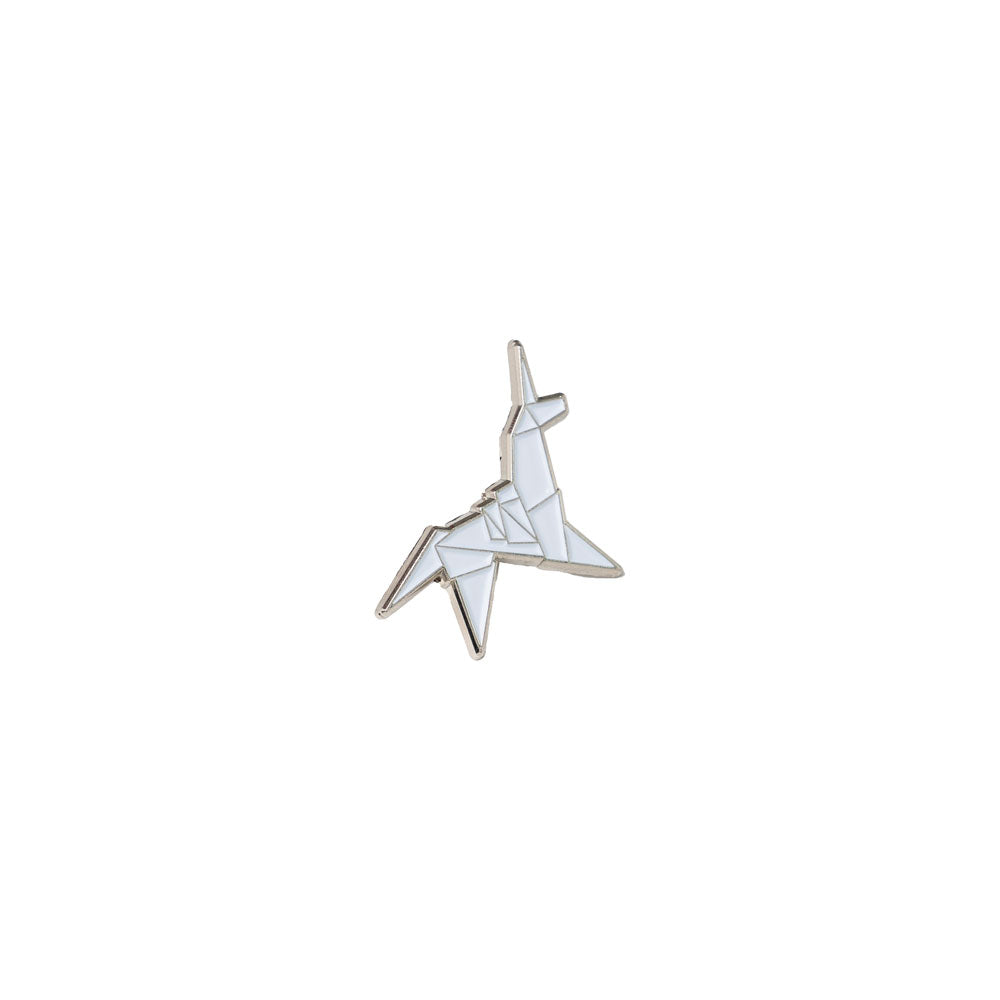 Closeup shot of the pin Silver horse-shaped brooch on a white background