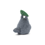 Plush toy of a gray Totoro by Studio Ghibli and Hayao Miyazaki with a green leaf on a white background. Embrace the cuteness of Totoro with this 4-inch bean bag plush! Perfectly soft and officially licensed, it's an ideal collectible for Studio Ghibli enthusiasts.