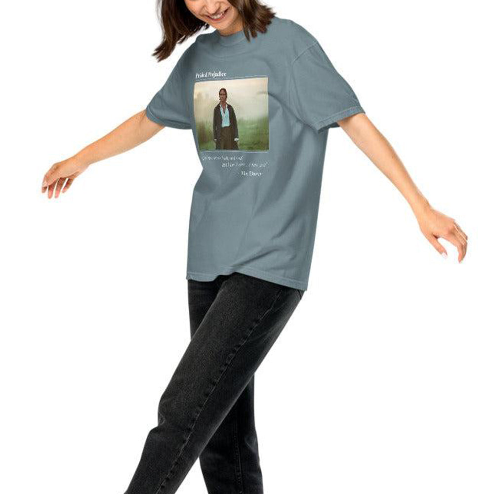 Person wearing a blue t-shirt with a graphic design on a white background