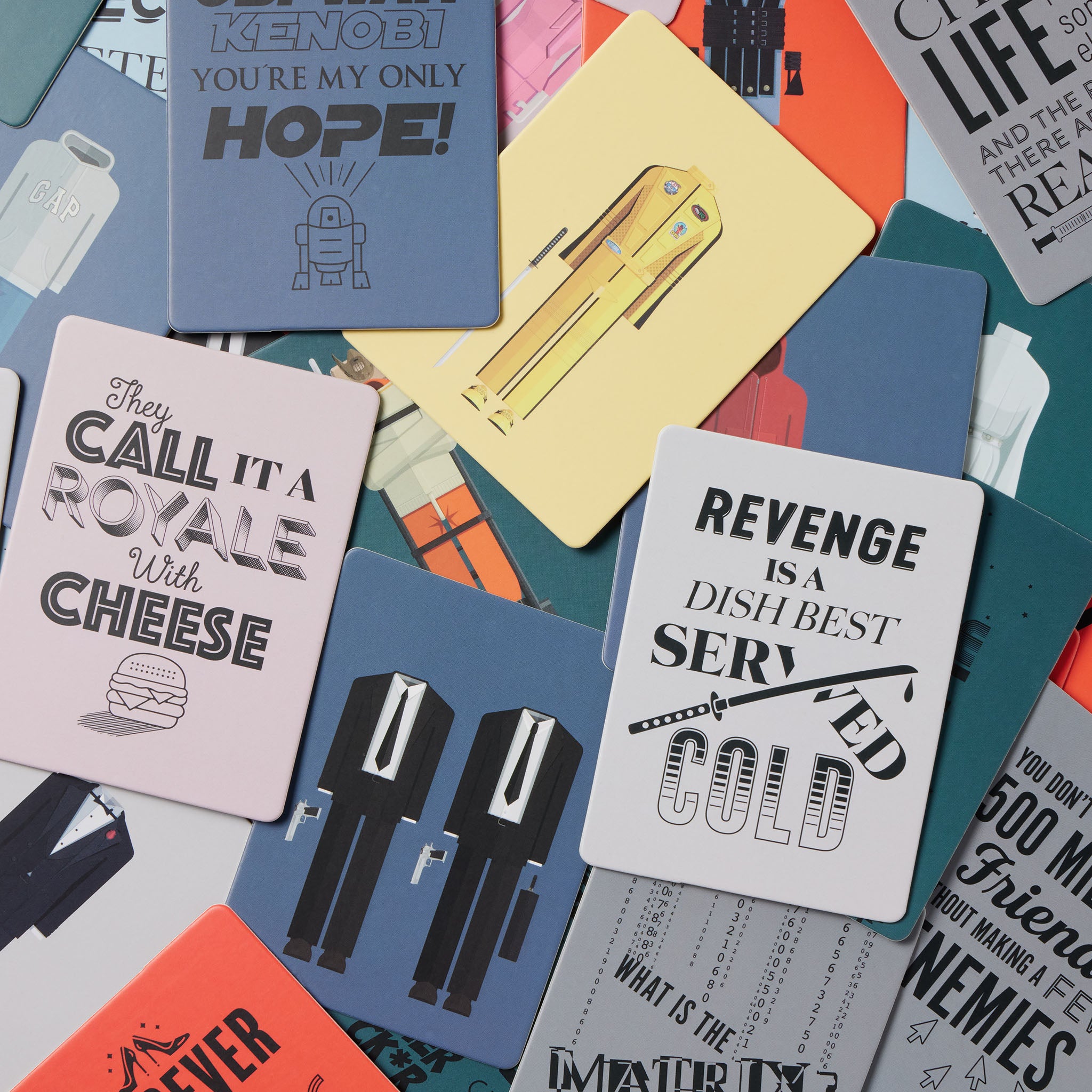Collection of colorful cards with various designs and text on a multicolored background