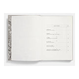 Open book with a table of contents on a white background