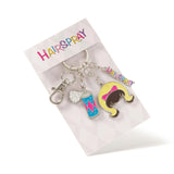 Keychain set with 'Hairspray' theme on a branded card