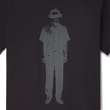 Black t-shirt with a white graphic of a person wearing a hat on a plain background image of mr. Kim from the movie Parasite